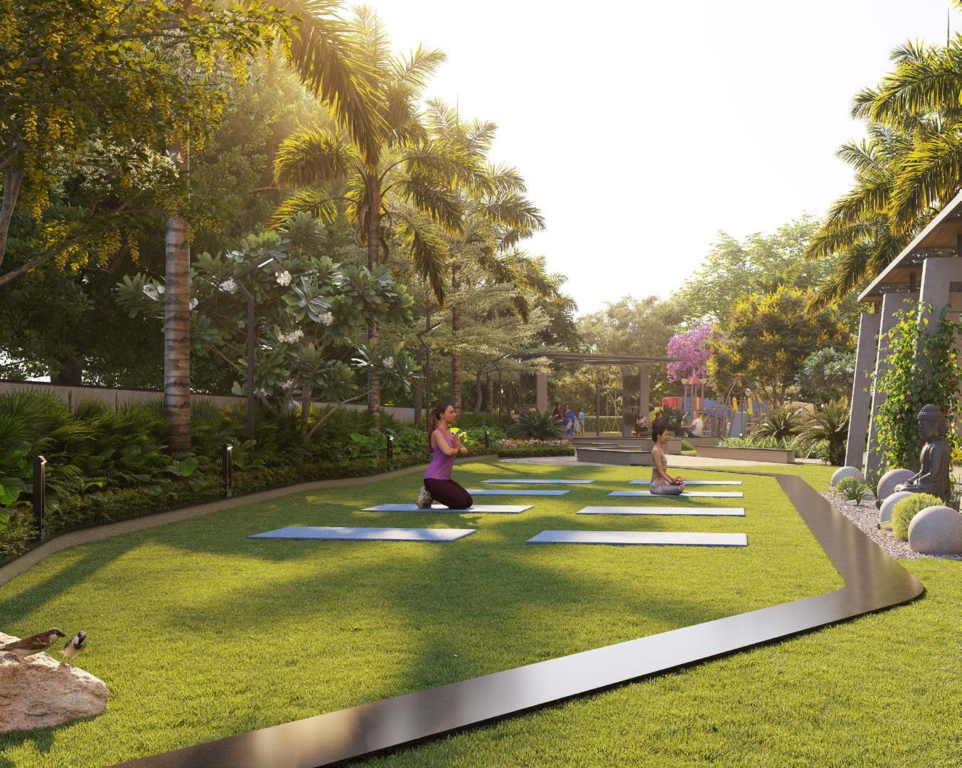 Landscaped lawns with outdoor yoga at Ixora